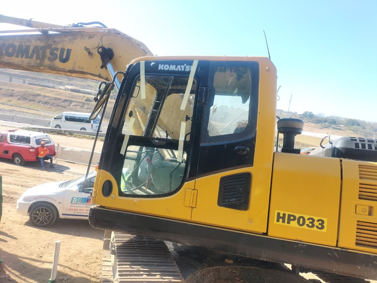 Komatsu excavator cab glass replacement on site