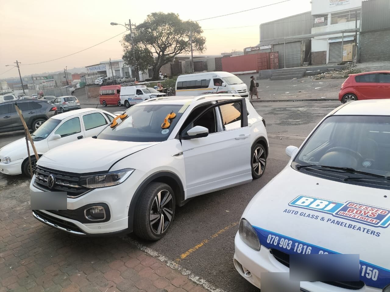 VW T-Cross windscreen replacement next to a BBi service bakkie